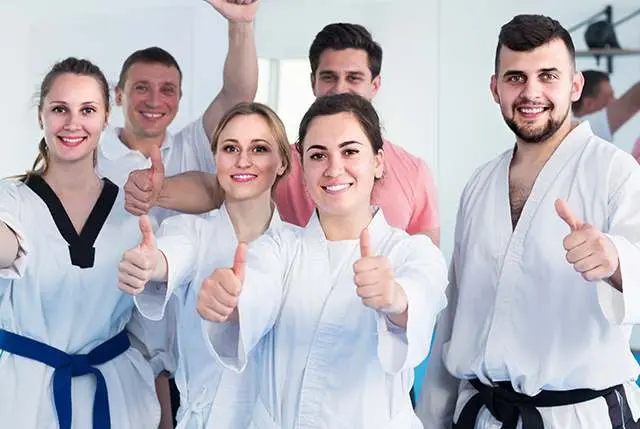 adults showing confidence during adult martial arts lessons