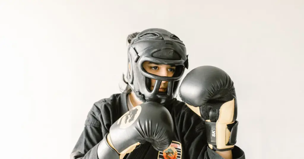 Woman practices wrist control with partner during situational awareness for self defense