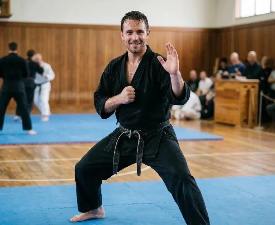 adult doing stances for adult karate classes